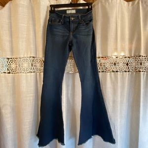 Free People bell bottom / flare jeans! Super soft - I’d say mid rise. 25 short.